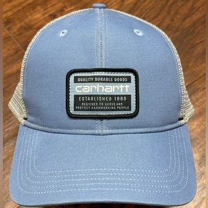 New, never worn Carhartt trucker hat, multi-size, light blue and gray in color.
